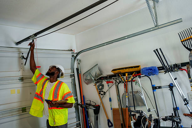 Professional Garage Door Panel Replacement technician working in Linn County County, KS